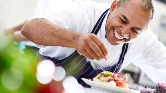 Happy Chef prepping Food and Drink