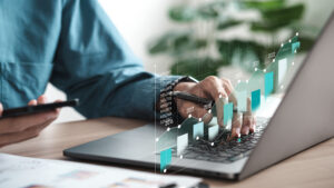 person on laptop nurturing contacts