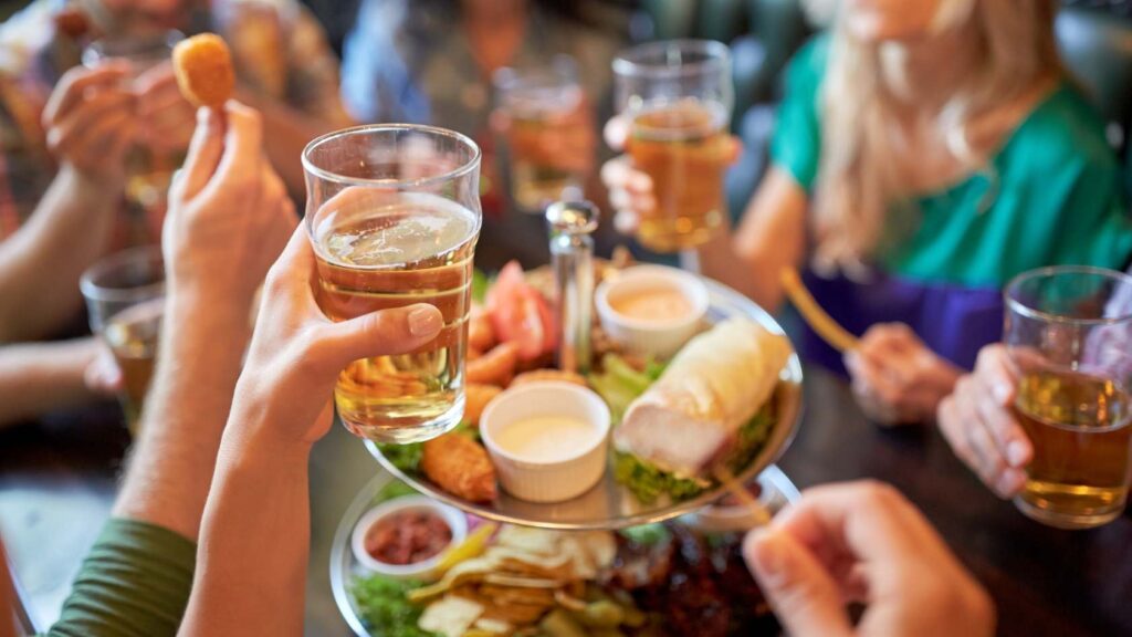 New Event Venue people gathering over food and drink